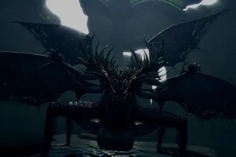 Potężny, mroczny, **gaping dragon** z wieloma skrzydłami i kolczastą głową, czai się w mroku.