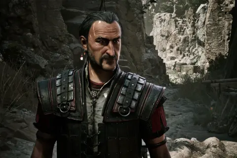 Postać z gry Gothic 2 Remake w zbroi, na tle skalistego krajobrazu.