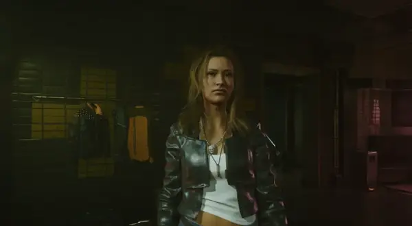 Kobieta w skórzanej kurtce, gotowa na nocne przygody w świecie cyberpunk romansów. W tle wieszaki z ubraniami.