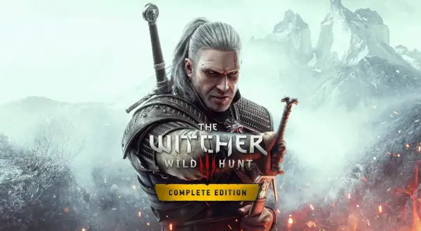 Geralt z Rivii, wiedźmin, w zbroi z dwoma mieczami. Na tle gór i płomieni. Okładka gry Wiedźmin 3 Edycja Kompletna.