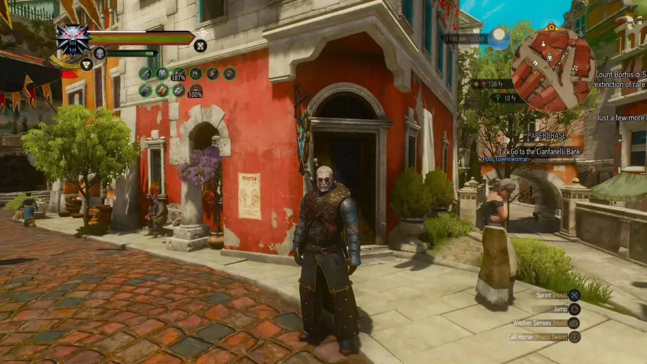 Geralt w zbroi z dwimerytowa blacha wiedźmin 3 stoi na brukowanej ulicy. W tle czerwony budynek i mapa.