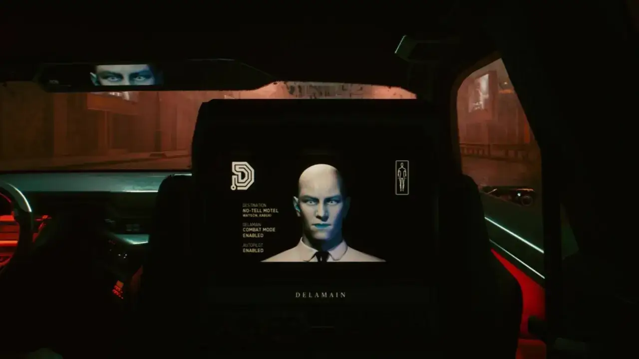Wnętrze samochodu z ekranem pokazującym twarz Delamaina, cel: No-Tell Motel, tryb bojowy i autopilota włączone. To może być początek reanimacji Delamaina w Cyberpunk 2077.
