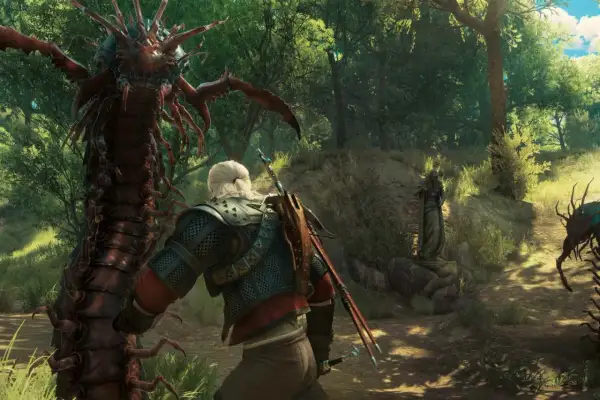 Geralt z Rivii staje naprzeciwko potężnego potwora z Wiedźmina w lesie. Inne potwory czają się w tle.